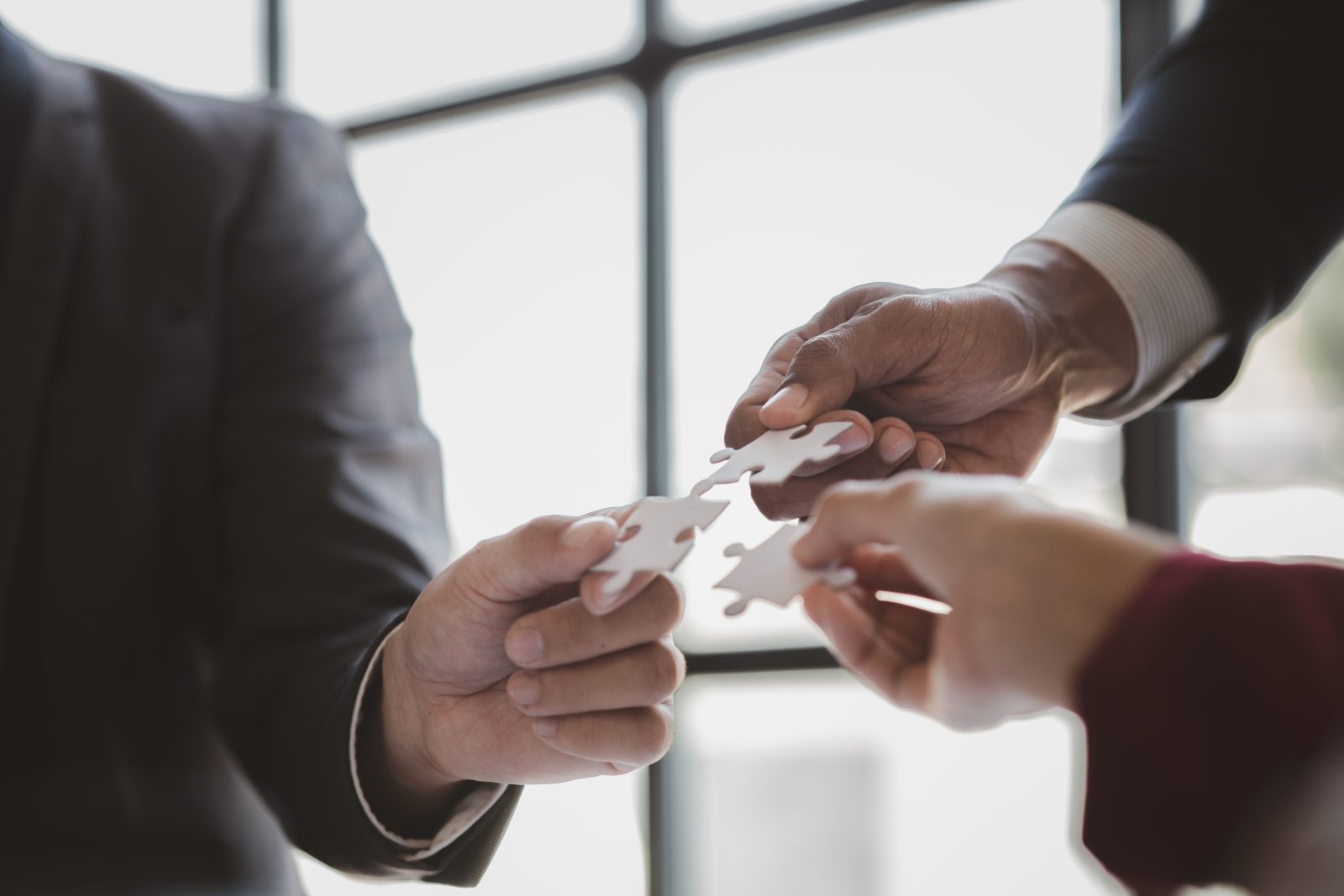 Business partners collaborating on a tailored security solution